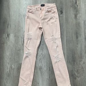 Light Pink Ripped Bebe skinny Jeans